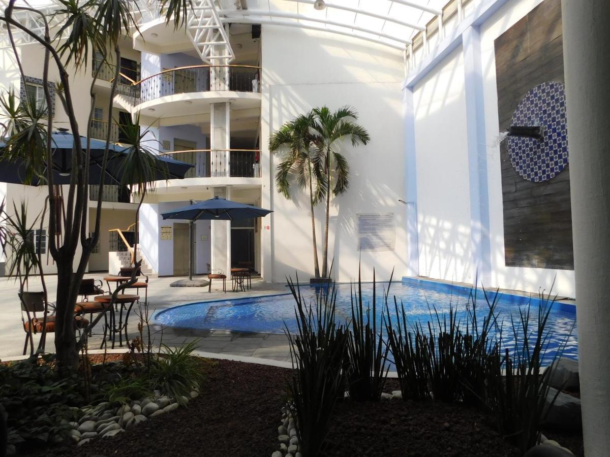 Plaza Poblana Hotel ปวยบลา ภายนอก รูปภาพ