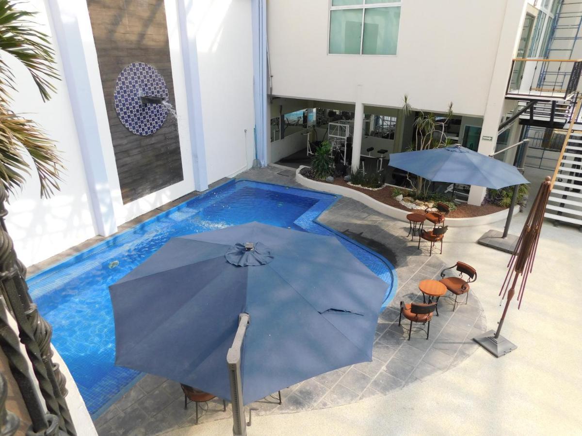 Plaza Poblana Hotel ปวยบลา ภายนอก รูปภาพ